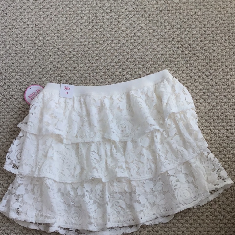 Justice white girls skirt.